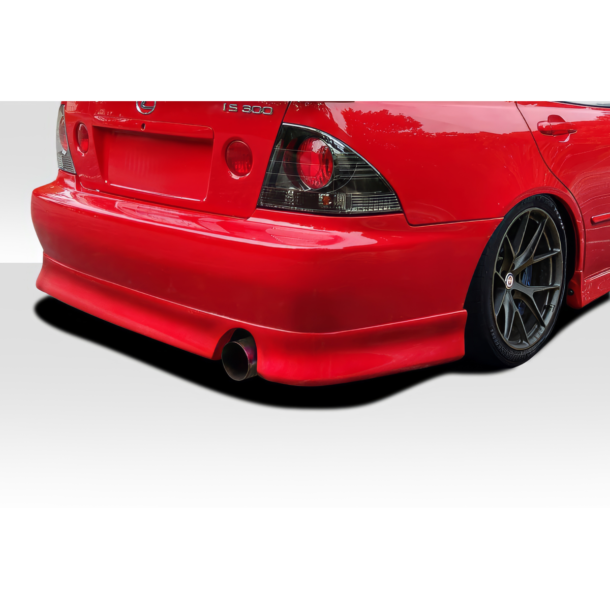 Modify your Lexus IS Series 2000 with our Exterior/Rear Bumpers or Lips - View from a low rear angle of the vehicle