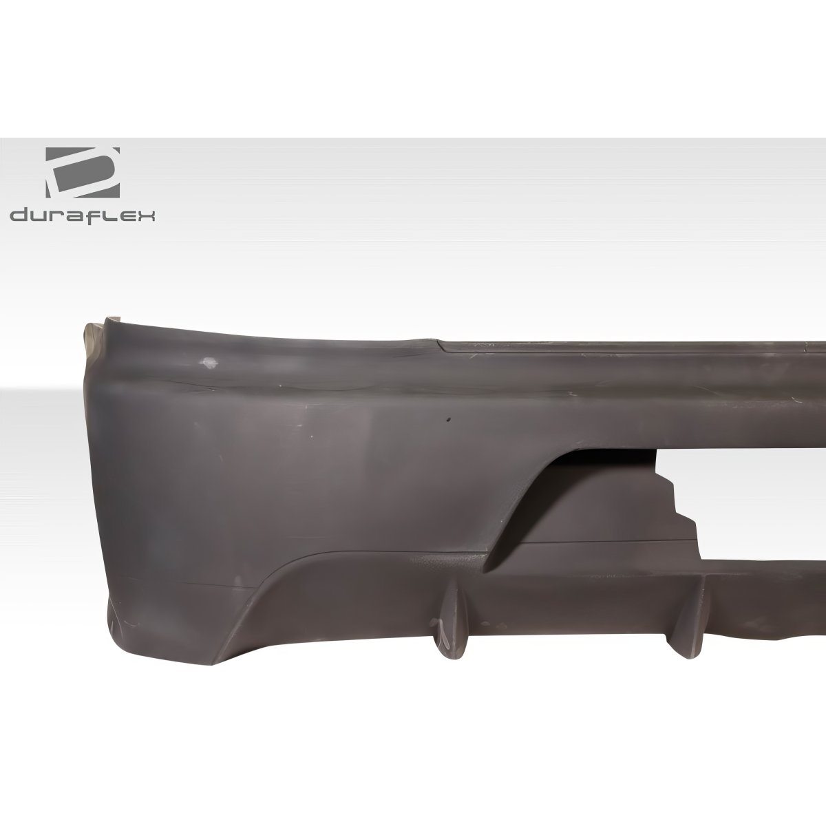 Modify your Mitsubishi Evolution 2003 with our Exterior/Rear Bumpers or Lips - Image shows rear bumper at a side angle