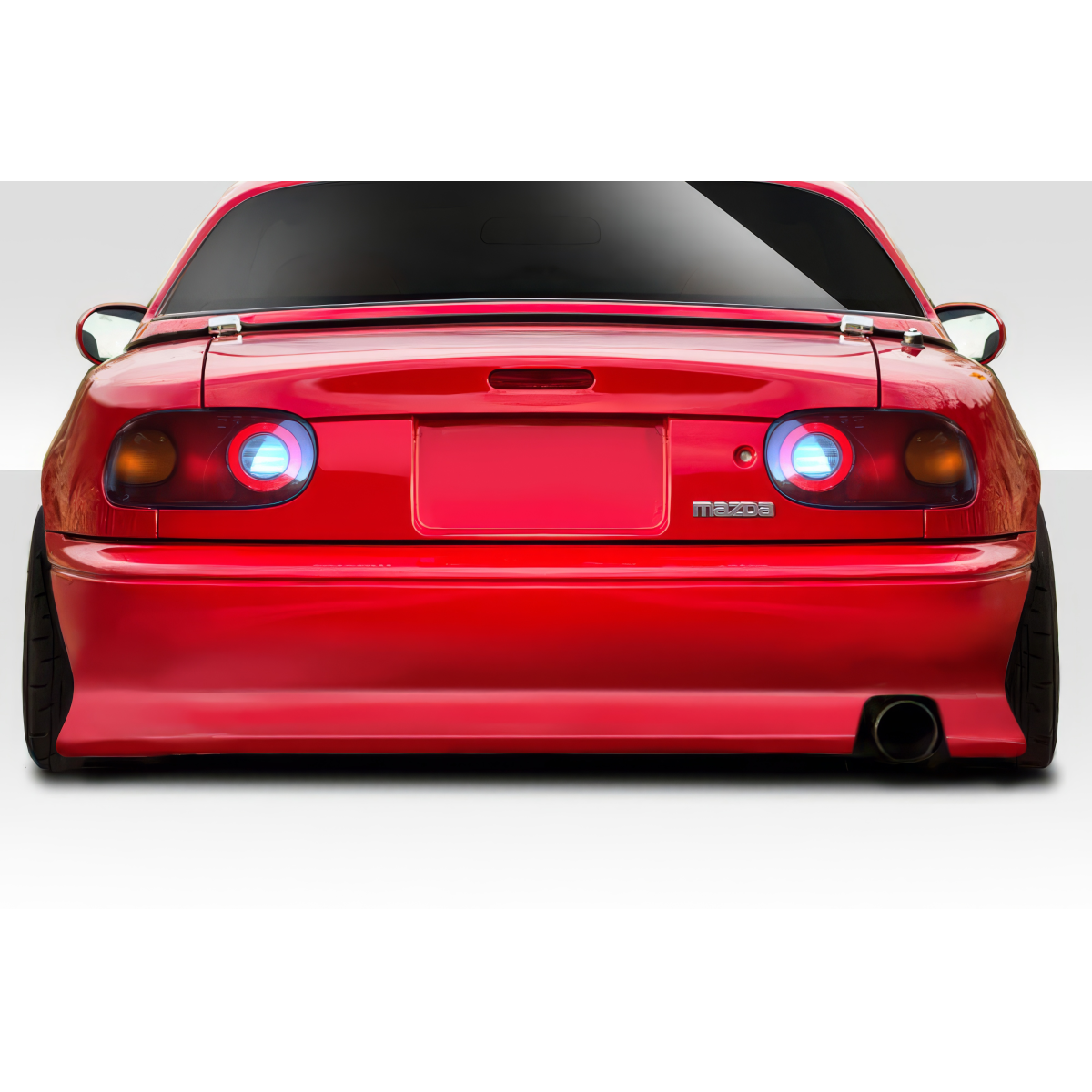 Modify your Mazda Miata 1990 with our Exterior/Rear Bumpers or Lips - Rear view of car showing the bumper at angle from rear