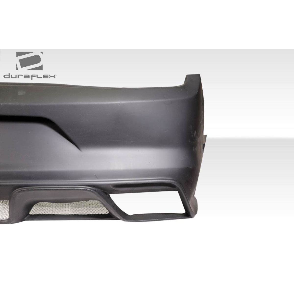 Modify your Ford Mustang 2013 with our Exterior/Rear Bumpers or Lips - Side view of rear bumper at slight angle