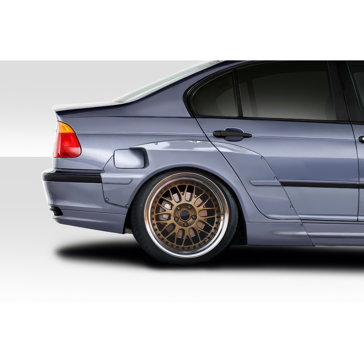 Modify your BMW 3-Series 1999 with our Exterior/Fenders - Side angle view of rear fender and wheel