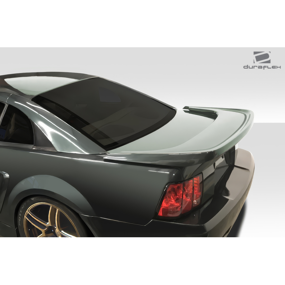 Modify your Ford Mustang 1999 with our Exterior/Wings - Rear angle view of the car part shown