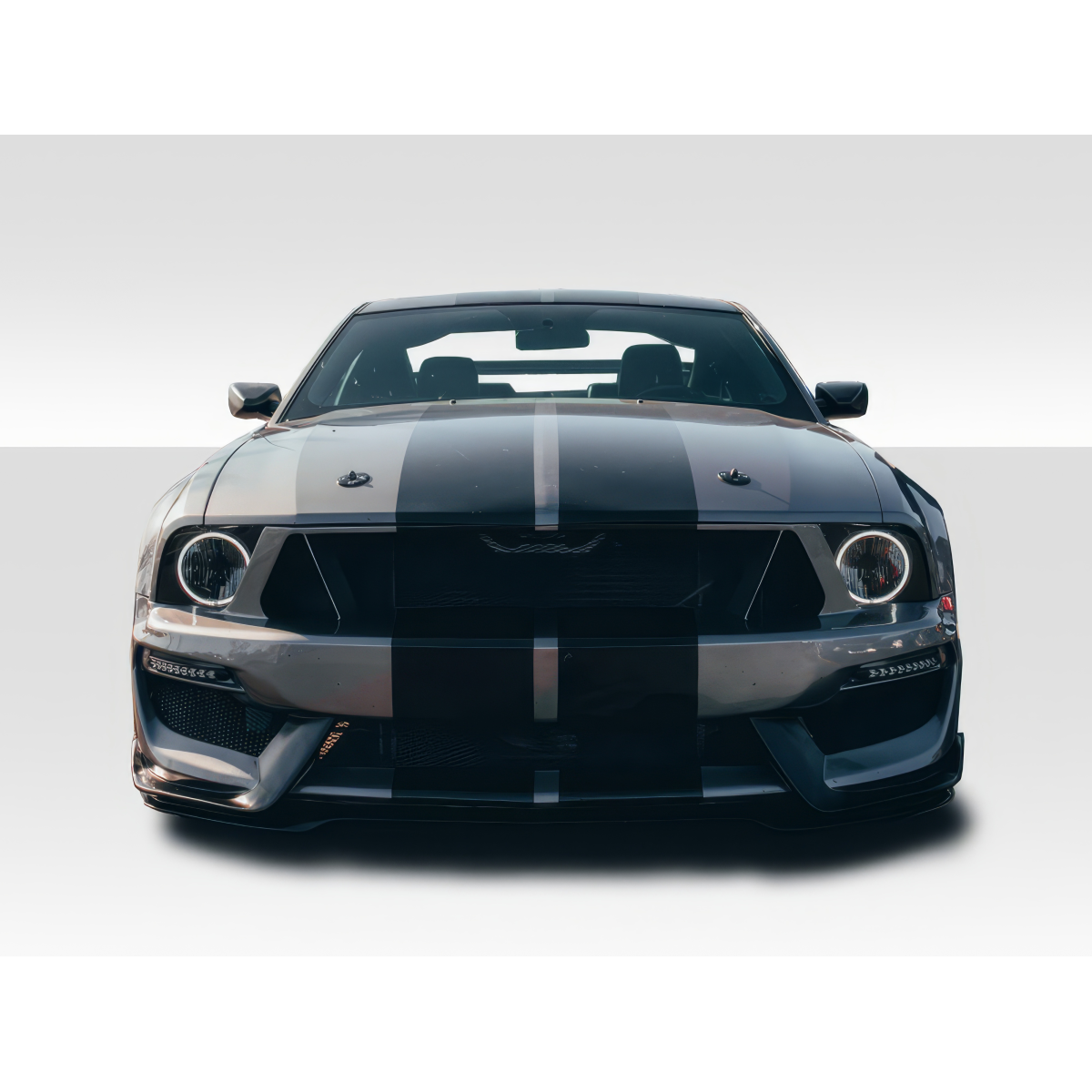 Modify your Ford Mustang 2005 with our Exterior/Front Bumpers or Lips - Front view of a black Ford Mustang