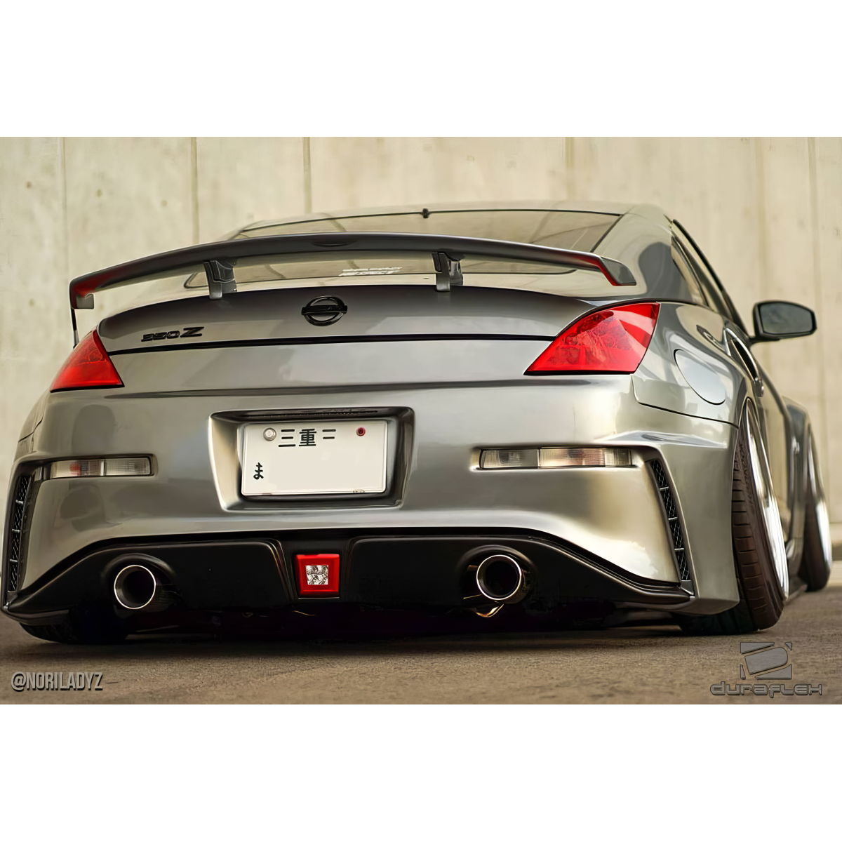 Modify your Nissan 350Z 2003 with our Exterior/Rear Bumpers or Lips - Viewed from a low rear angle