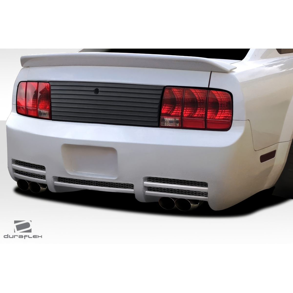 Modify your Ford Mustang 2005 with our Exterior/Rear Bumpers or Lips - Rear angle showcasing bumper design and exhaust tips