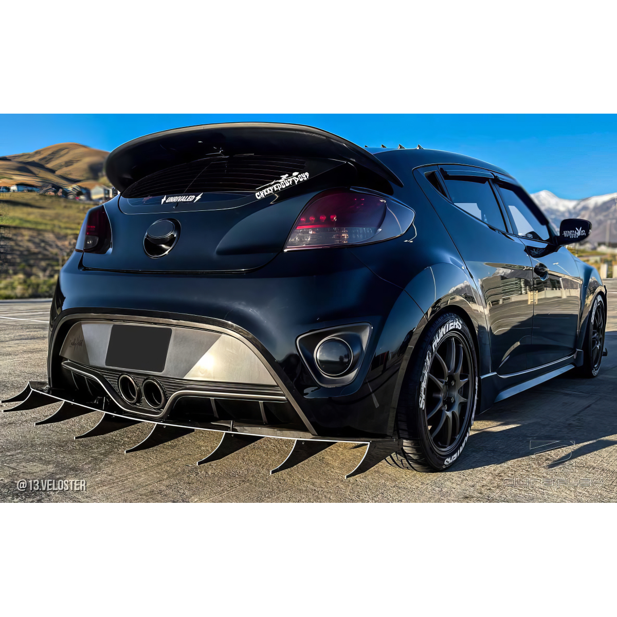 Modify your Hyundai Veloster 2012 with our Exterior/Wings - Image shows rear view at a low angle