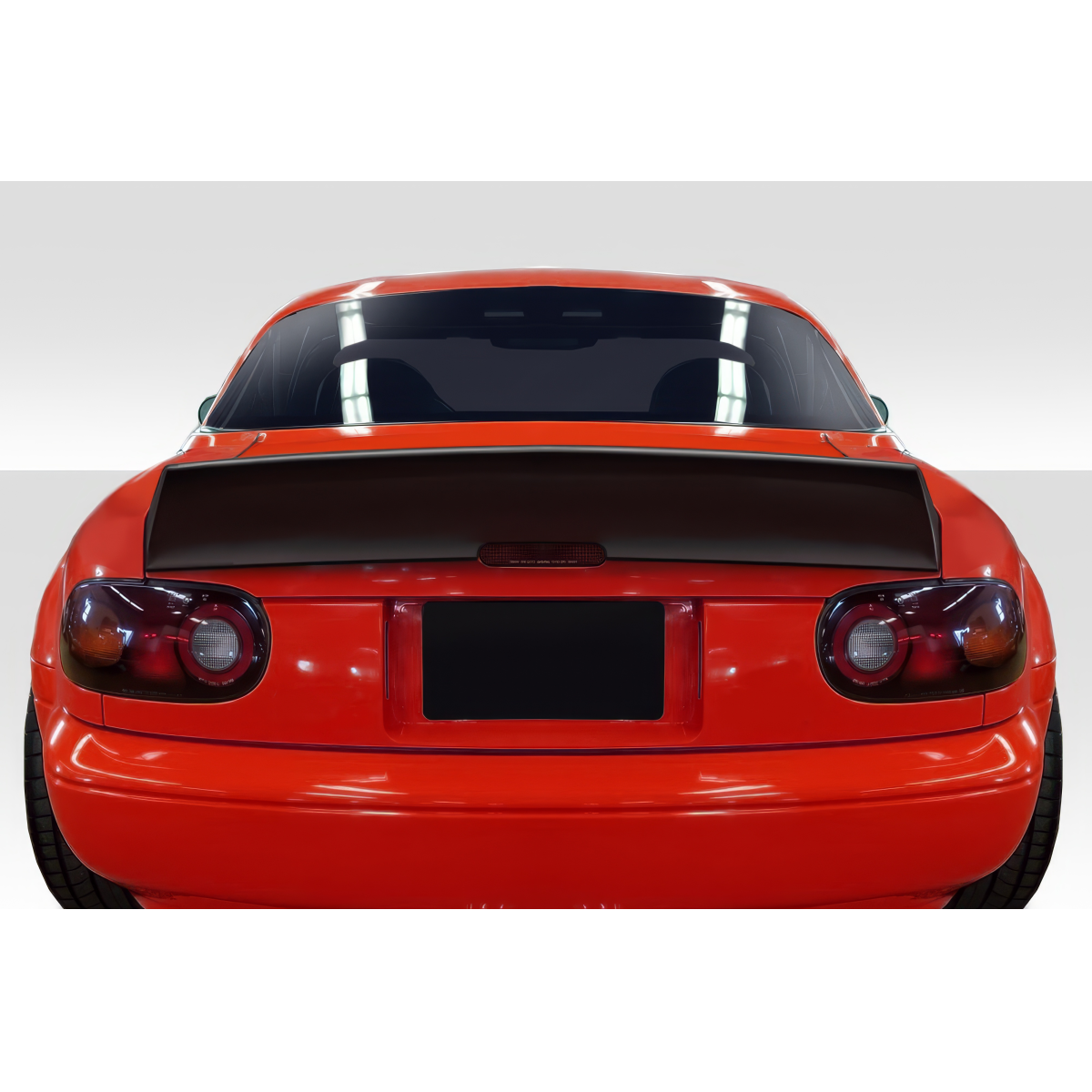 Modify your Mazda Miata 1990 with our Exterior/Wings - Rear view showing vehicle spoiler at a straight angle