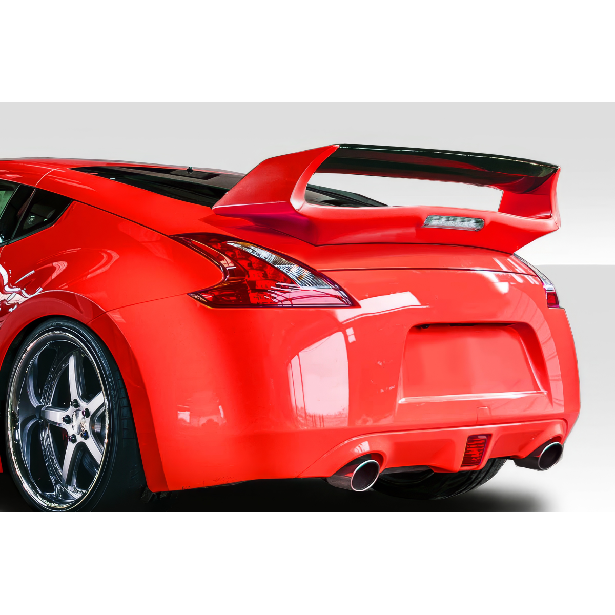 Modify your Nissan 370Z 2009 with our Exterior/Wings - Rear angle showing the wing and exhaust tips