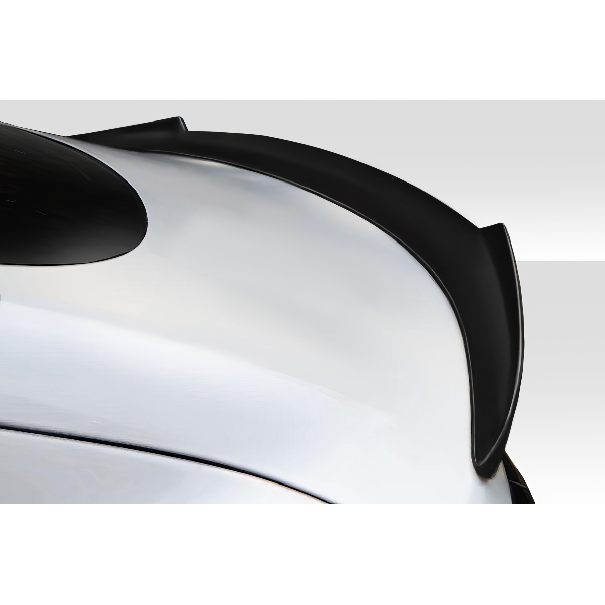 Modify your Tesla S 2012 with our Exterior/Wings - Rear angle view of black spoiler on silver car