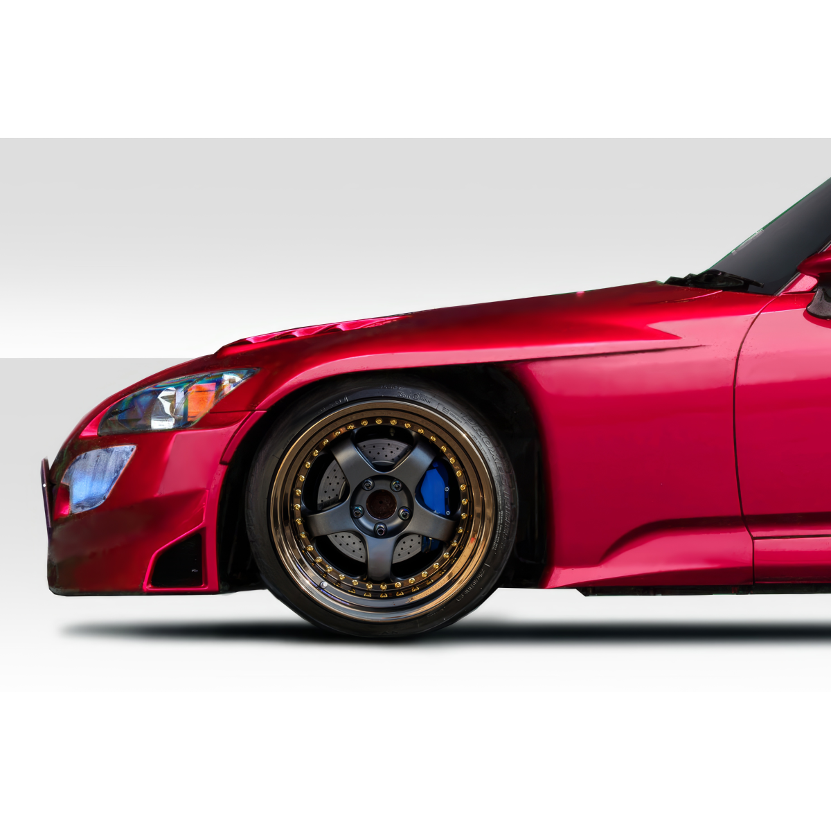 Modify your Honda S2000 2000 with our Exterior/Fenders - Side angle view of front fender and wheel