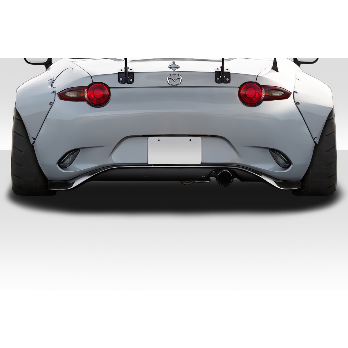 Modify your Mazda Miata 2016 with our Exterior/Rear Bumpers or Lips - Rear view of the car from a low angle