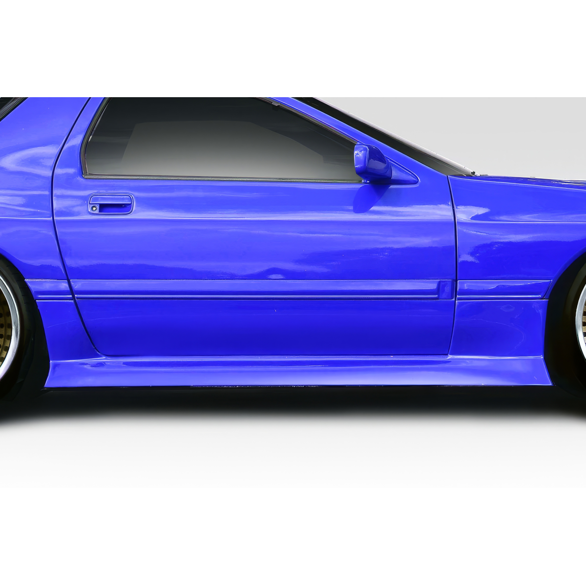 Modify your Mazda RX-7 1986 with our Exterior/Side Skirts - Side view at a slight angle with sleek design