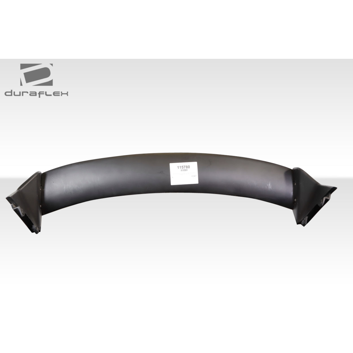 Modify your Mini Cooper 2007 with our Exterior/Wings - Rear wing spoiler is shown from a side angle