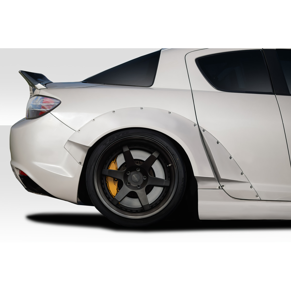 Modify your Mazda RX-8 2009 with our Exterior/Fenders - Side view angle showcasing fender flares installation