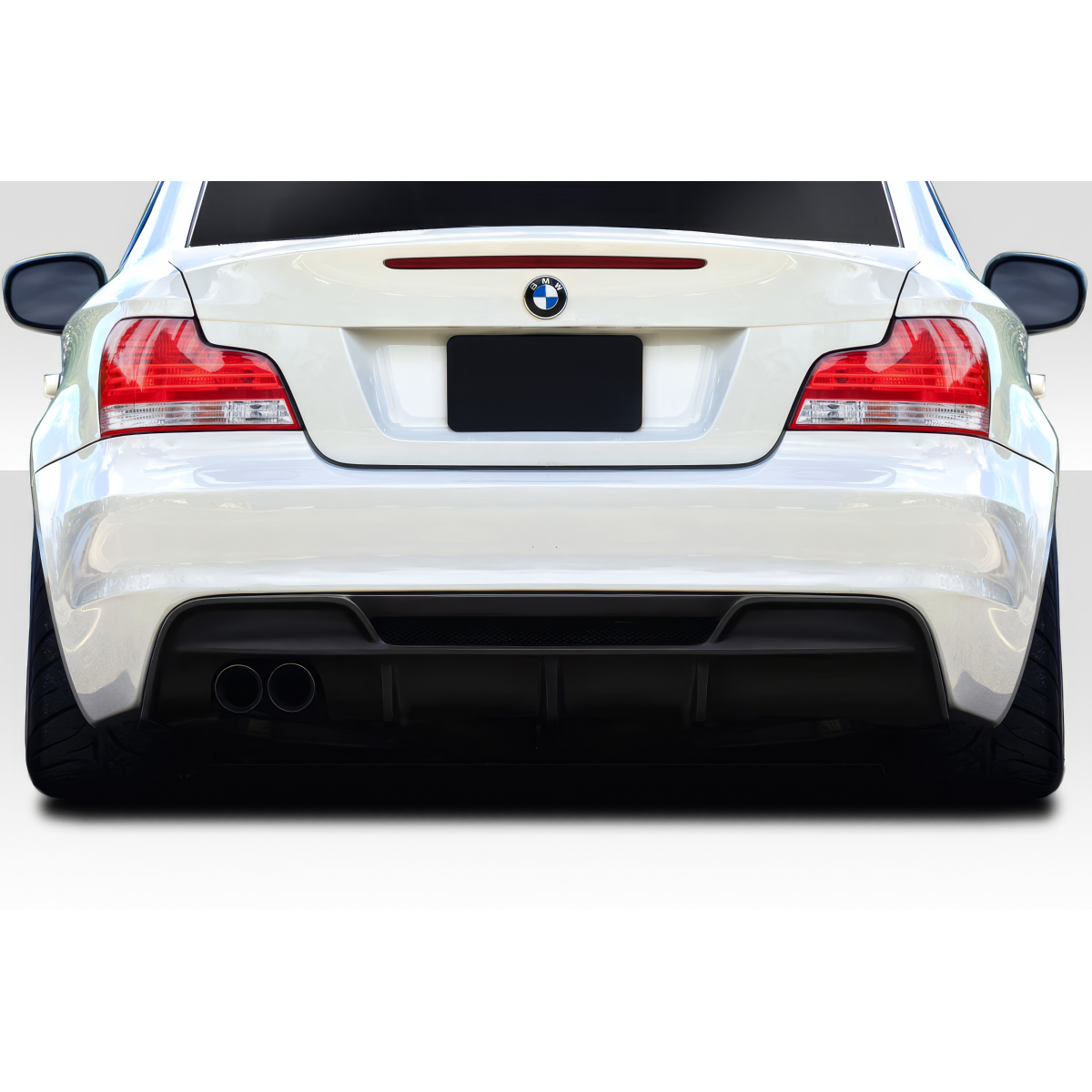 Modify your BMW 1-Series 2008 with our Exterior/Diffusers - Rear angle view of a BMW 1 series