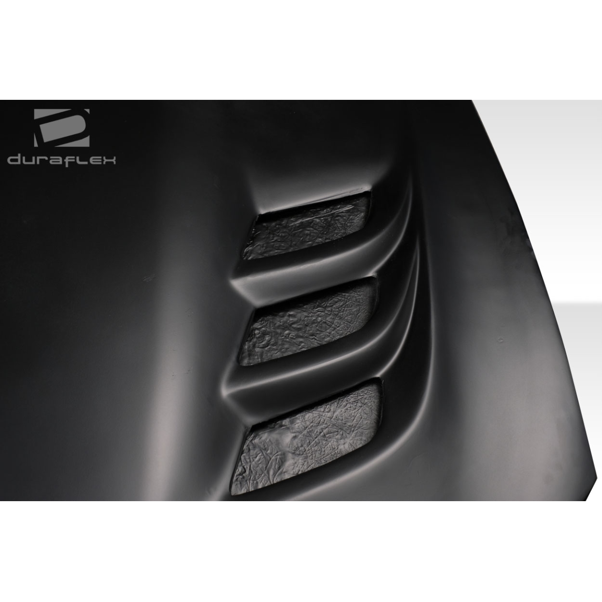 Modify your Dodge Charger 2015 with our Exterior/Hoods - Angled view of the hood showing air vents