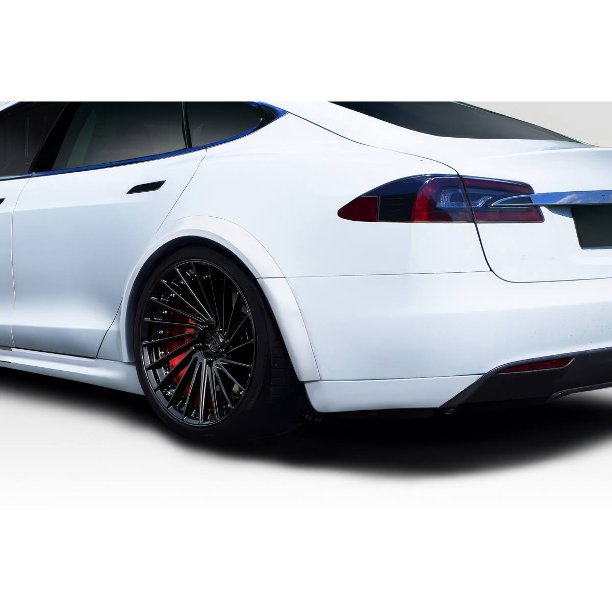 Modify your Tesla S 2012 with our Exterior/Fenders - Rear angle showcasing Tesla Model S fender flares