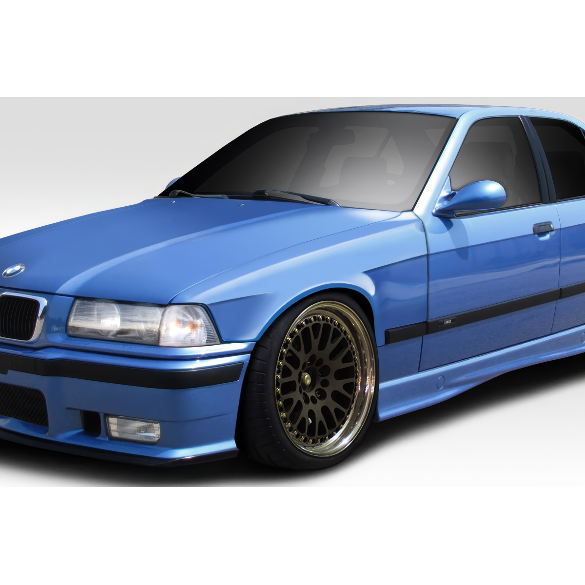 Modify your BMW 3-Series 1992 with our Exterior/Fenders - Front angle view of the blue BMW 3 Series