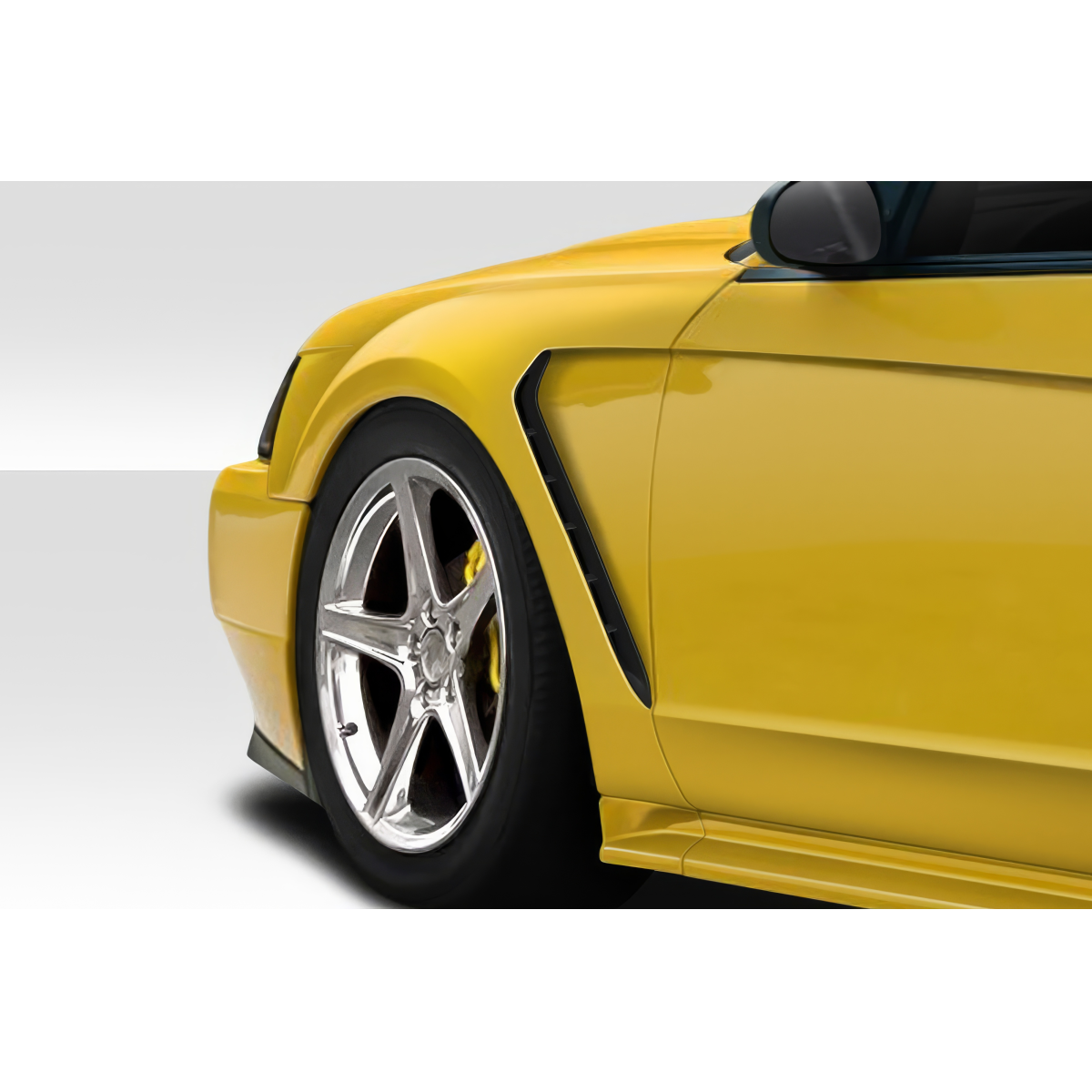 Modify your Ford Mustang 1999 with our Exterior/Fenders - Front angle view of Mustang fender with polished wheels