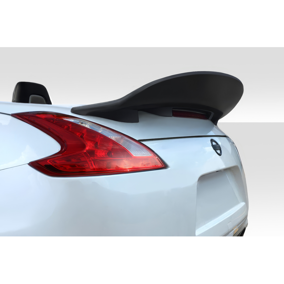 Modify your Nissan 370Z 2009 with our Exterior/Wings - Rear angle view of the vehicle and spoiler