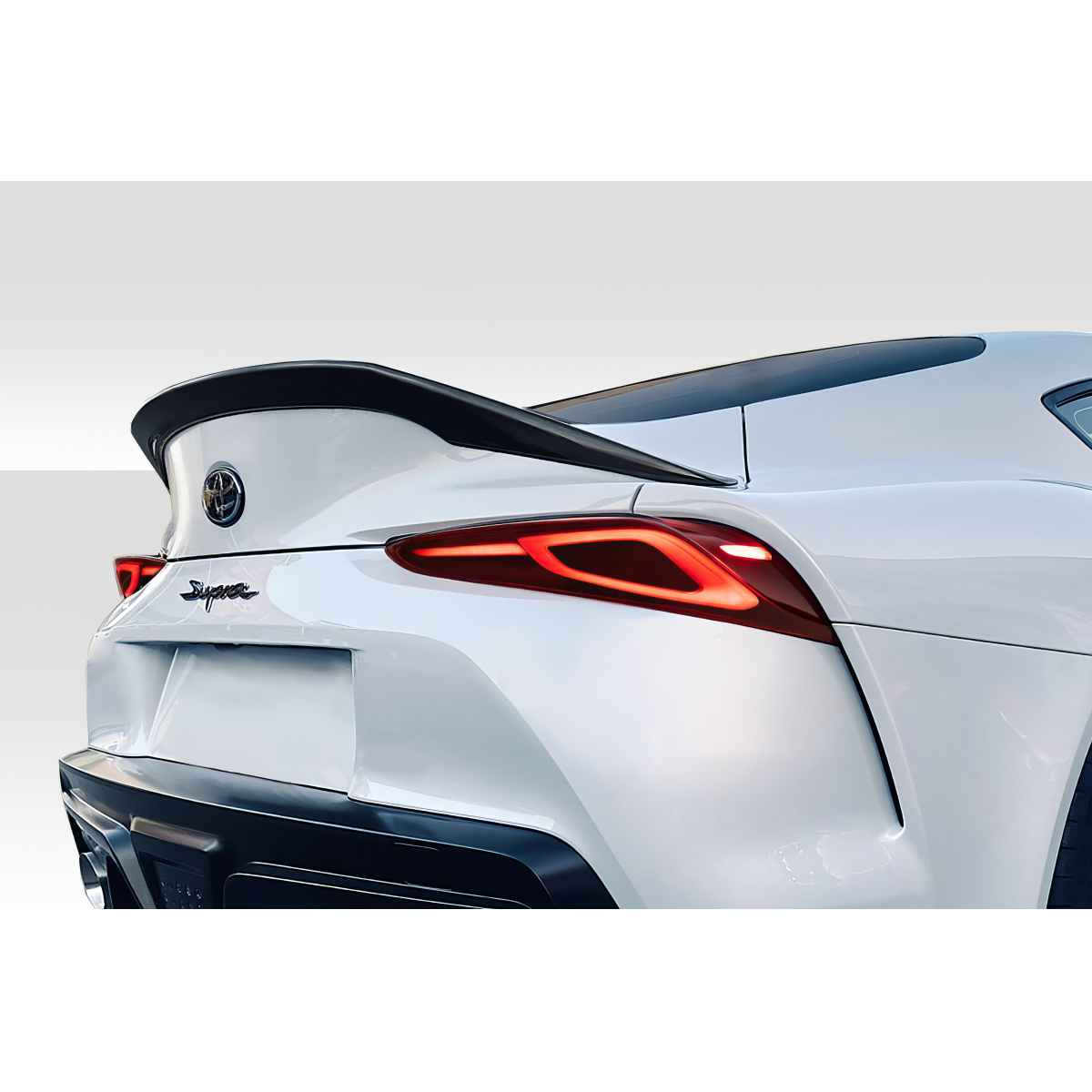 Modify your Toyota Supra 2019 with our Exterior/Wings - Rear angle view of Toyota Supra with spoiler