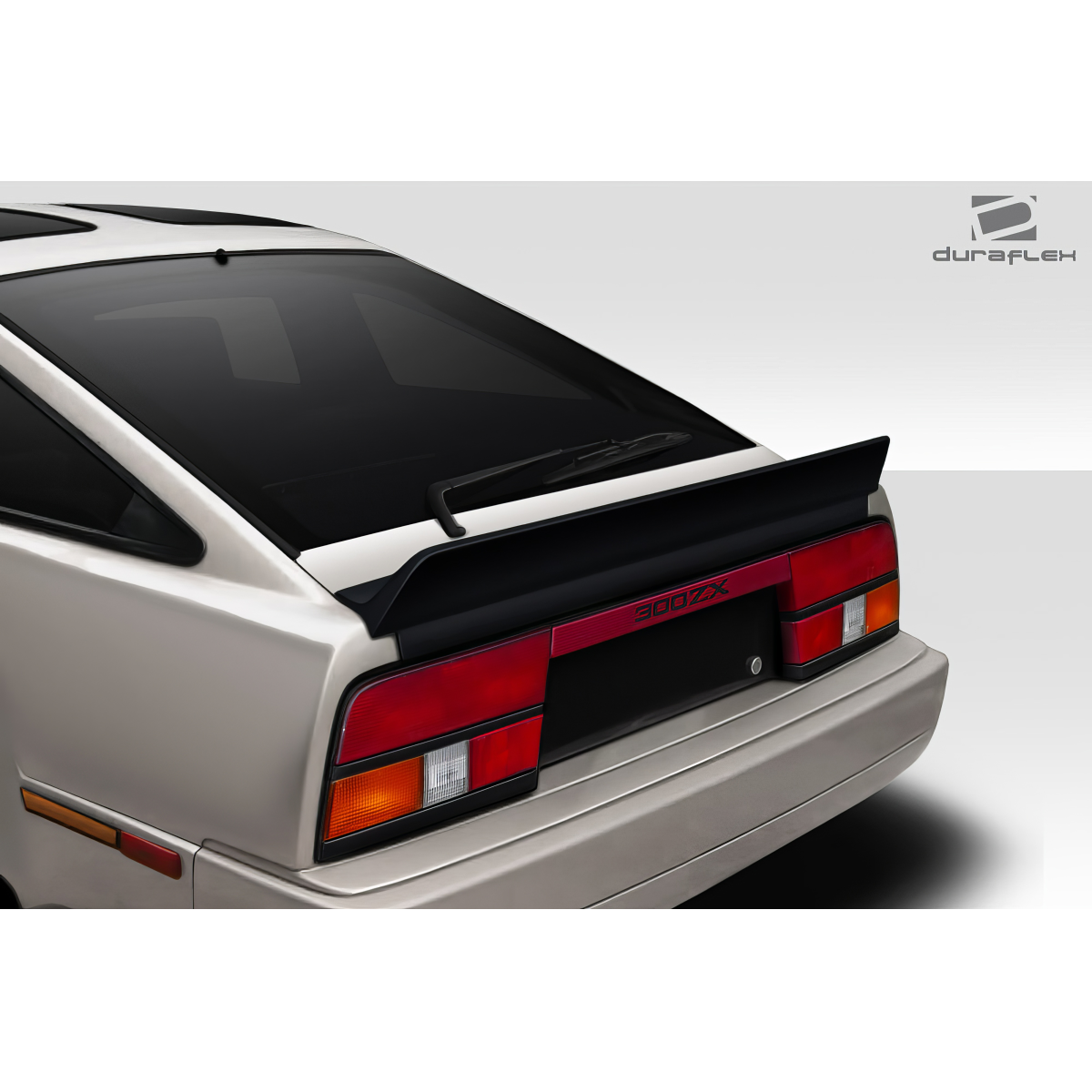 Modify your Nissan 300ZX 1984 with our Exterior/Wings - Rear angle view of Nissan 300ZX Z31 spoiler