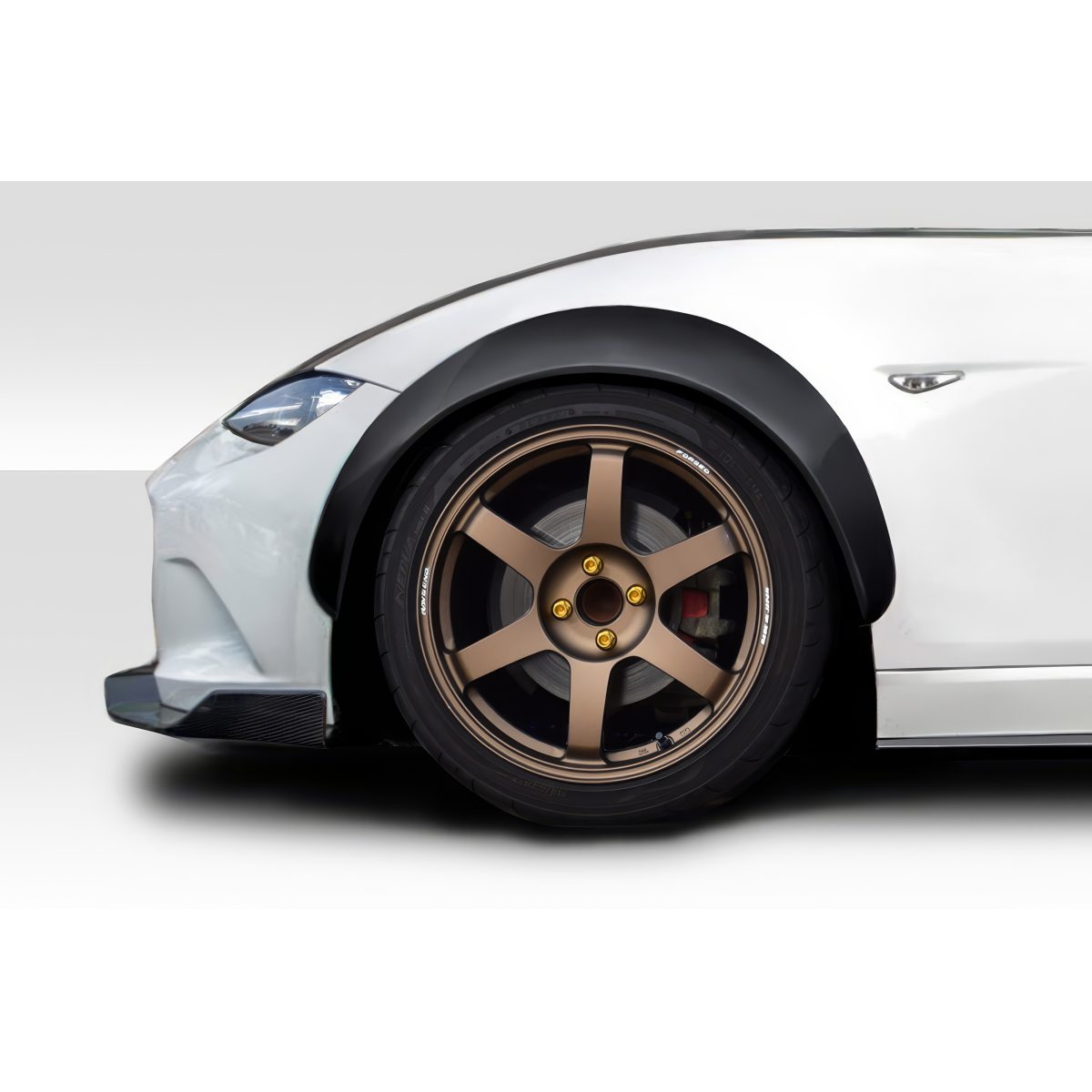 Modify your Mazda Miata 2016 with our Exterior/Fenders - Side angle view of the front wheel and fender