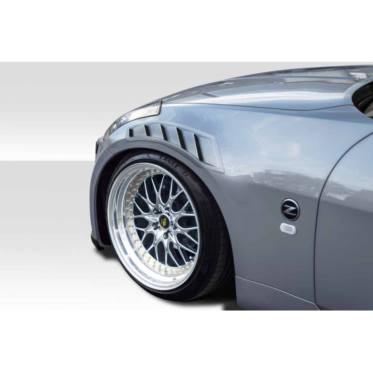 Modify your Nissan 350Z 2003 with our Exterior/Fenders - Angle shows fender and wheel with vents clearly