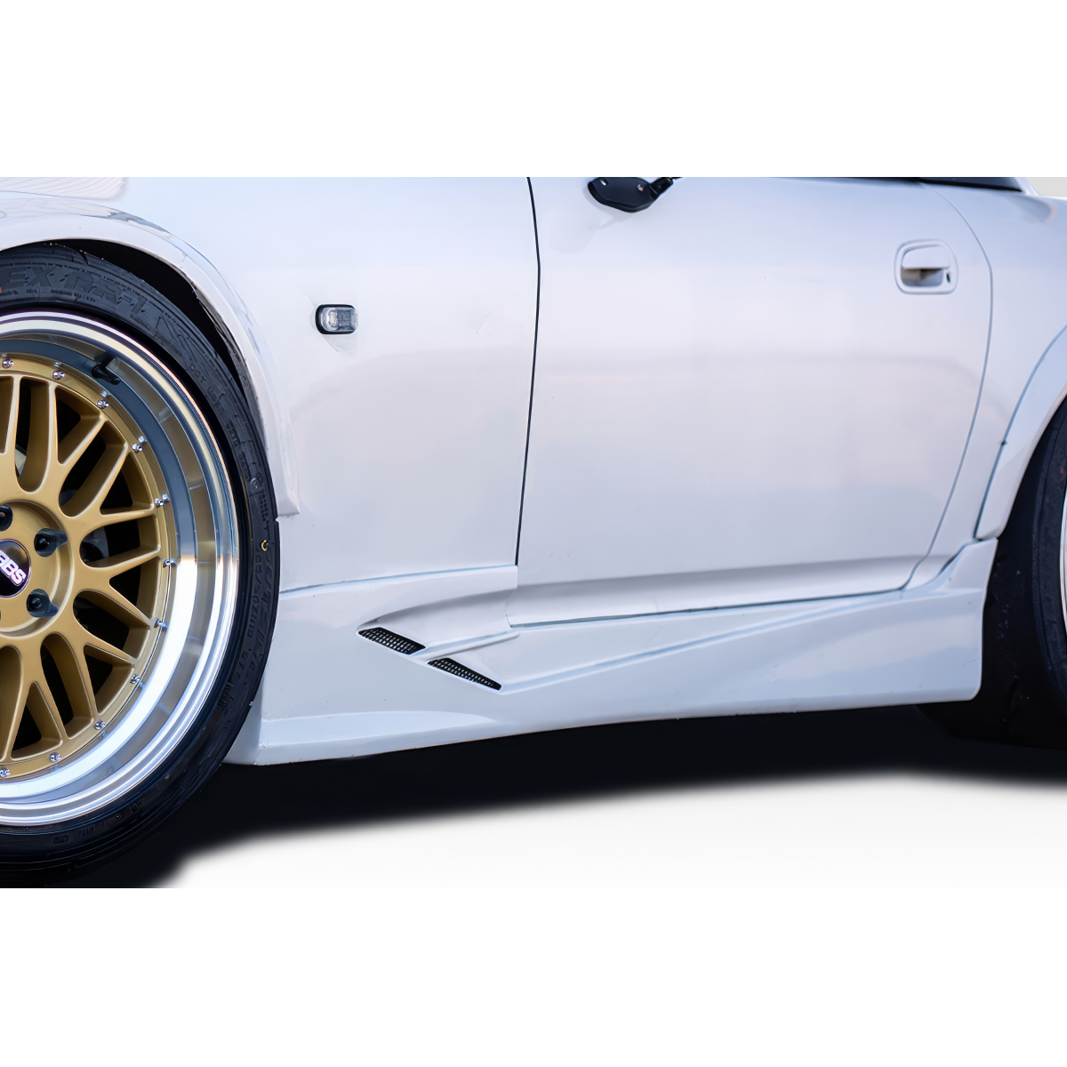 Modify your Honda S2000 2000 with our Exterior/Side Skirts - Side view of the vehicle showing skirts