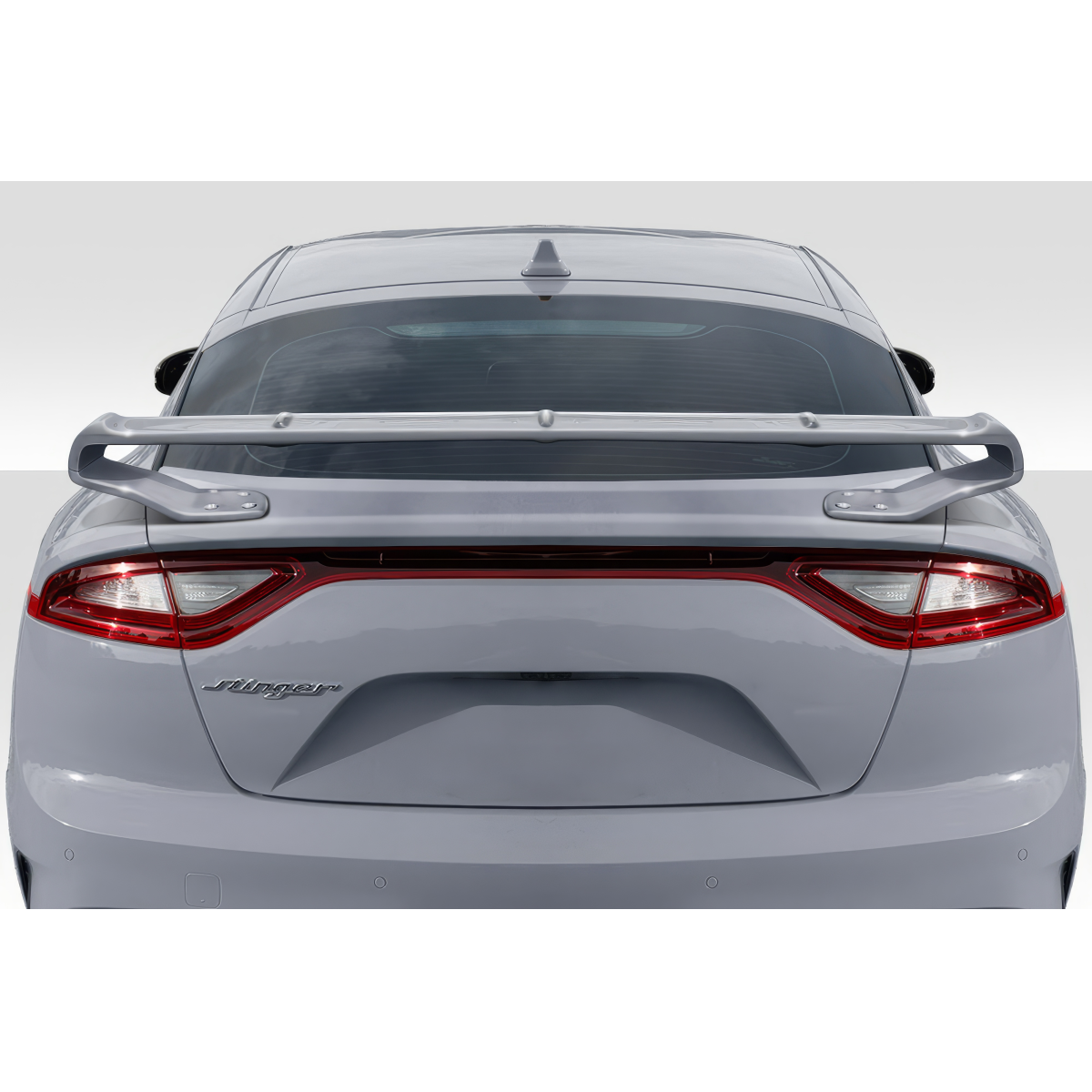 Modify your KIA Stinger 2018 with our Exterior/Wings - Rear view of a car with spoiler at a slight angle