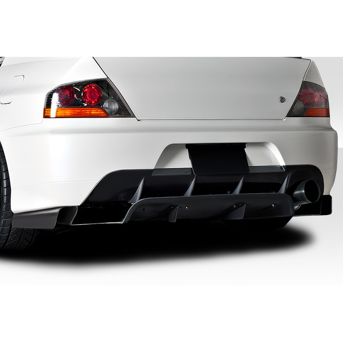 Modify your Mitsubishi Evolution 2003 with our Exterior/Diffusers - View from a low angle showcasing rear diffuser design