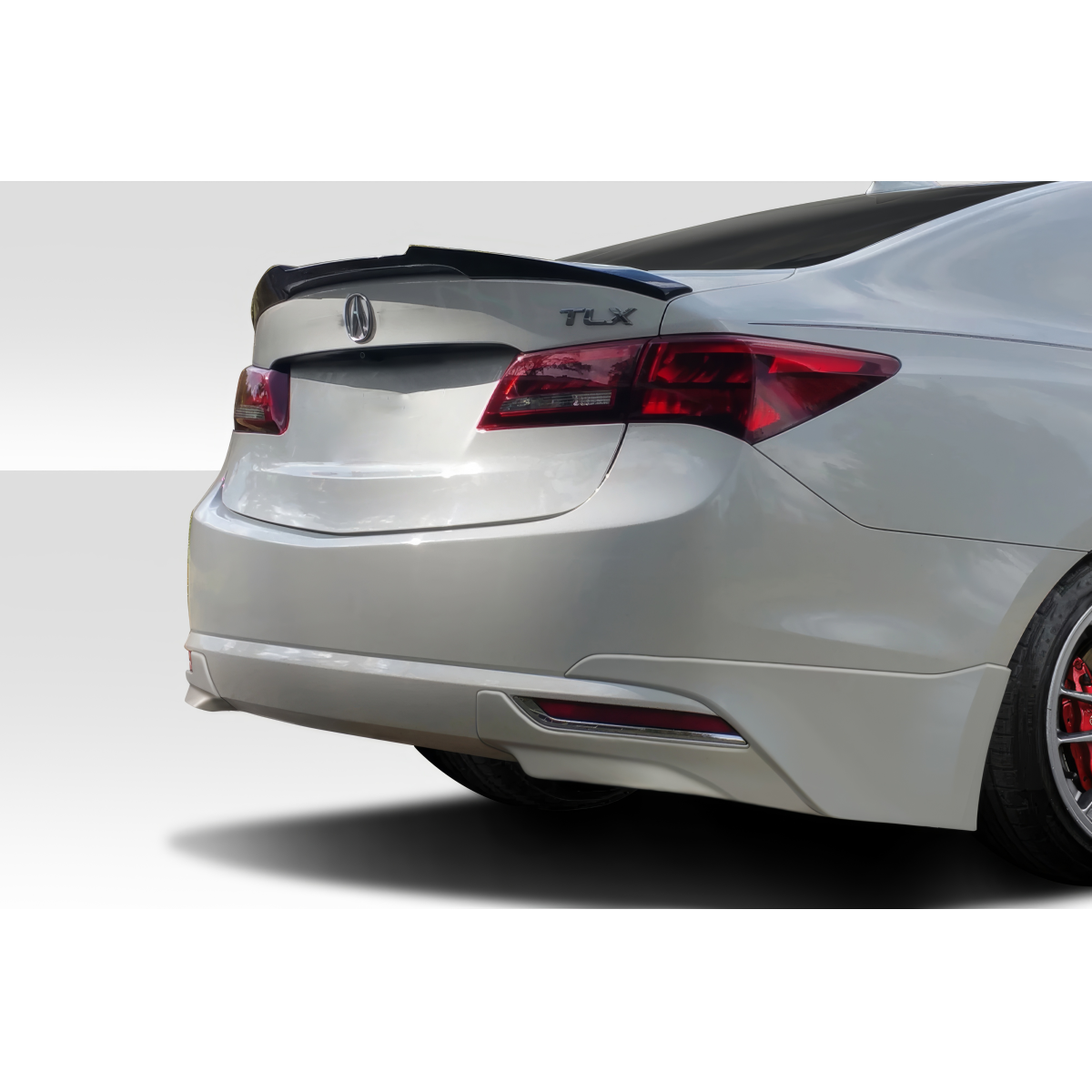 Modify your Acura TLX 2015 with our Exterior/Rear Bumpers or Lips - Rear angle view of Acura TLX rear bumper part