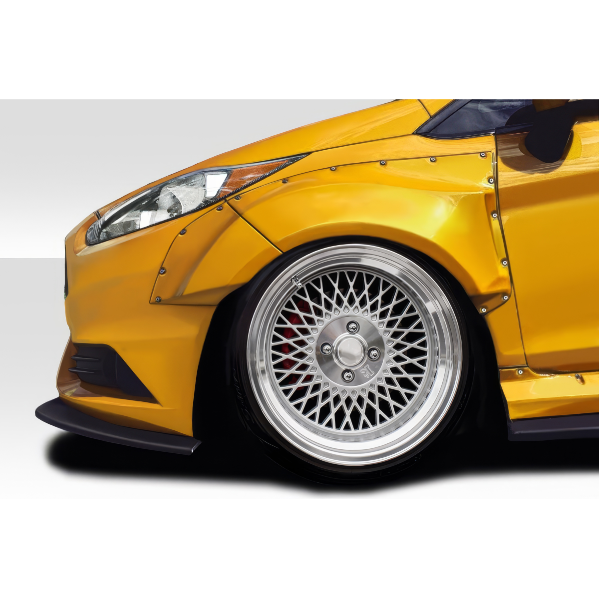 Modify your Ford Fiesta 2014 with our Exterior/Fenders - Angle showing the front left fender and wheel