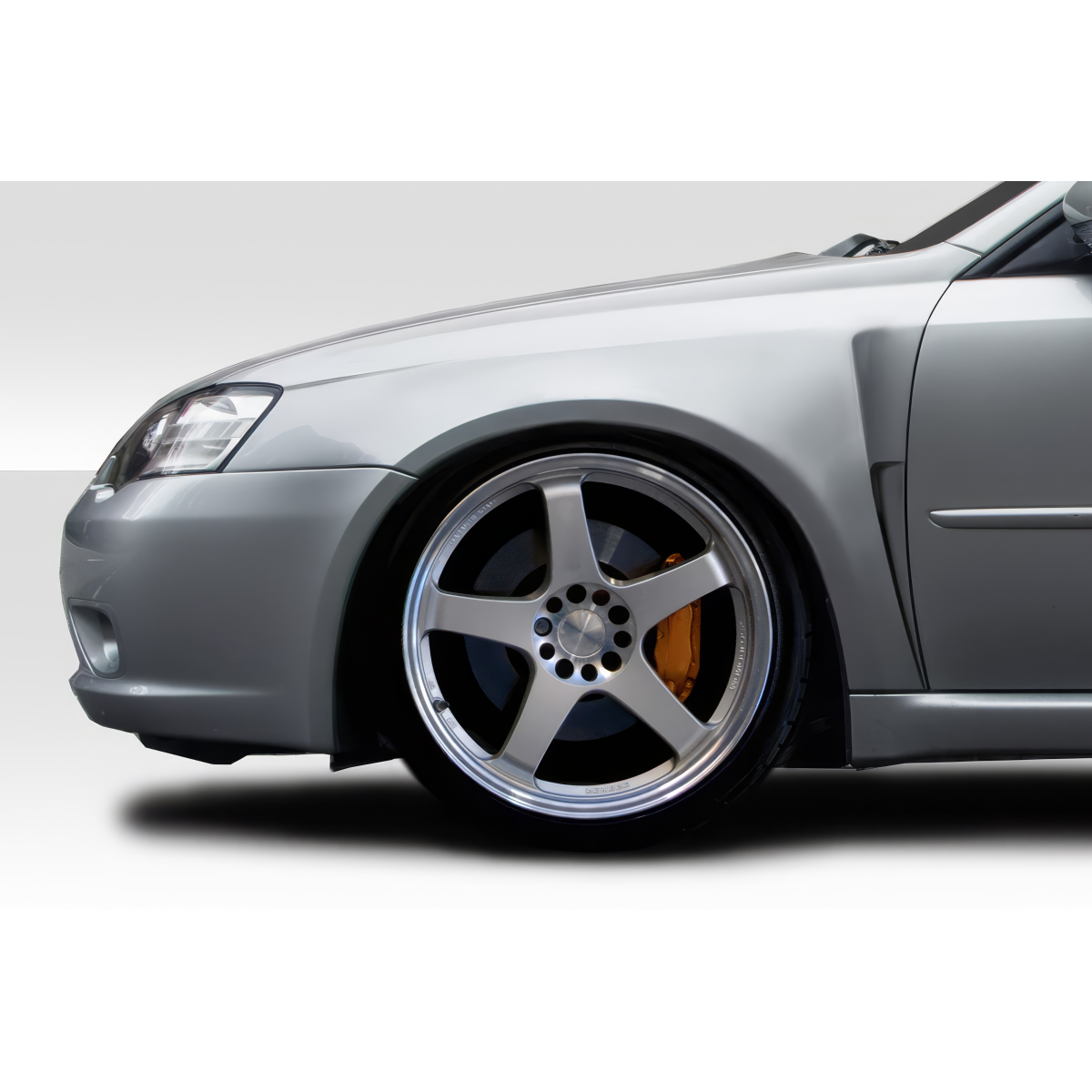 Modify your Subaru Impreza 2008 with our Exterior/Fenders - Front angle view of a car fender and wheel