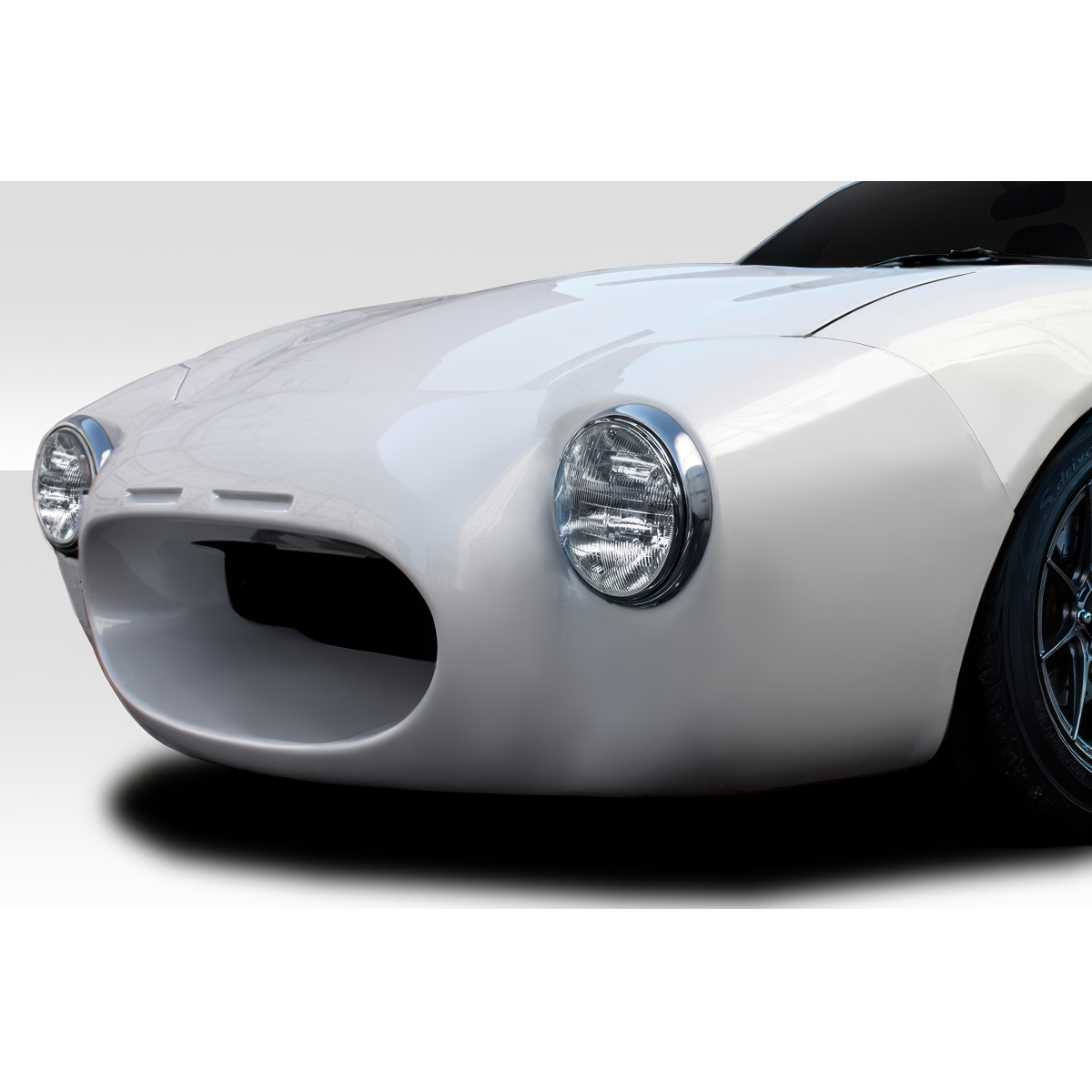 Modify your Mazda Miata 1990 with our Exterior/Front Bumpers - Front angle view of the vehicle part