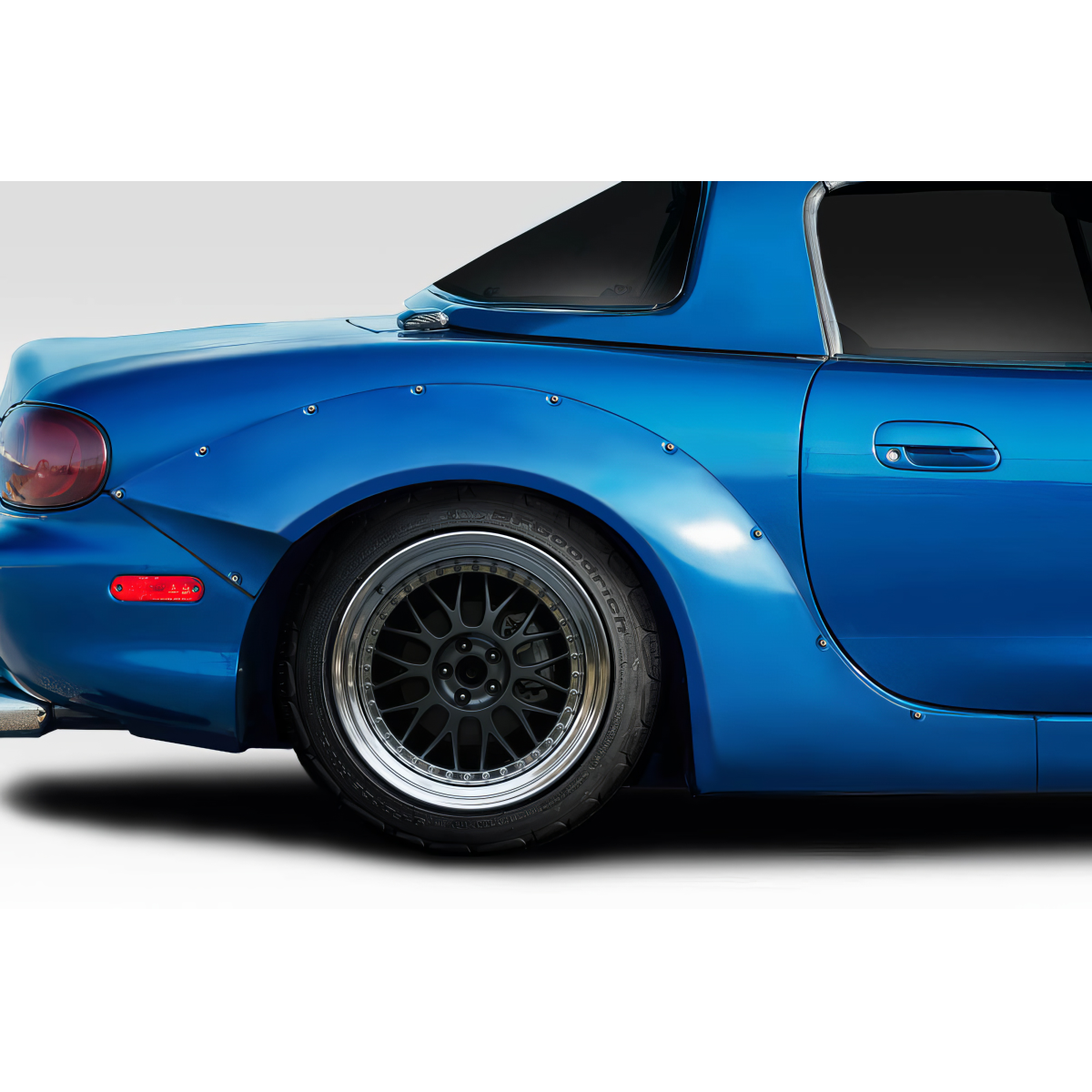 Modify your Mazda Miata 1999 with our Exterior/Fenders - Side angle view of rear fender flares