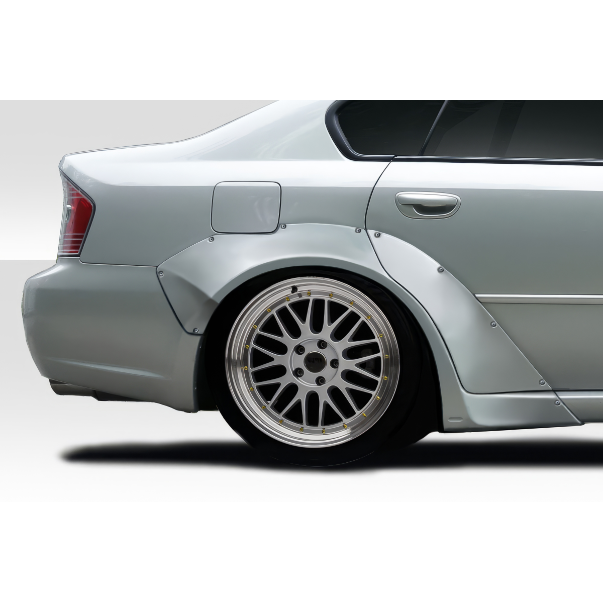 Modify your Subaru Legacy 2005 with our Exterior/Fenders - Side angle view of modified rear fender flares