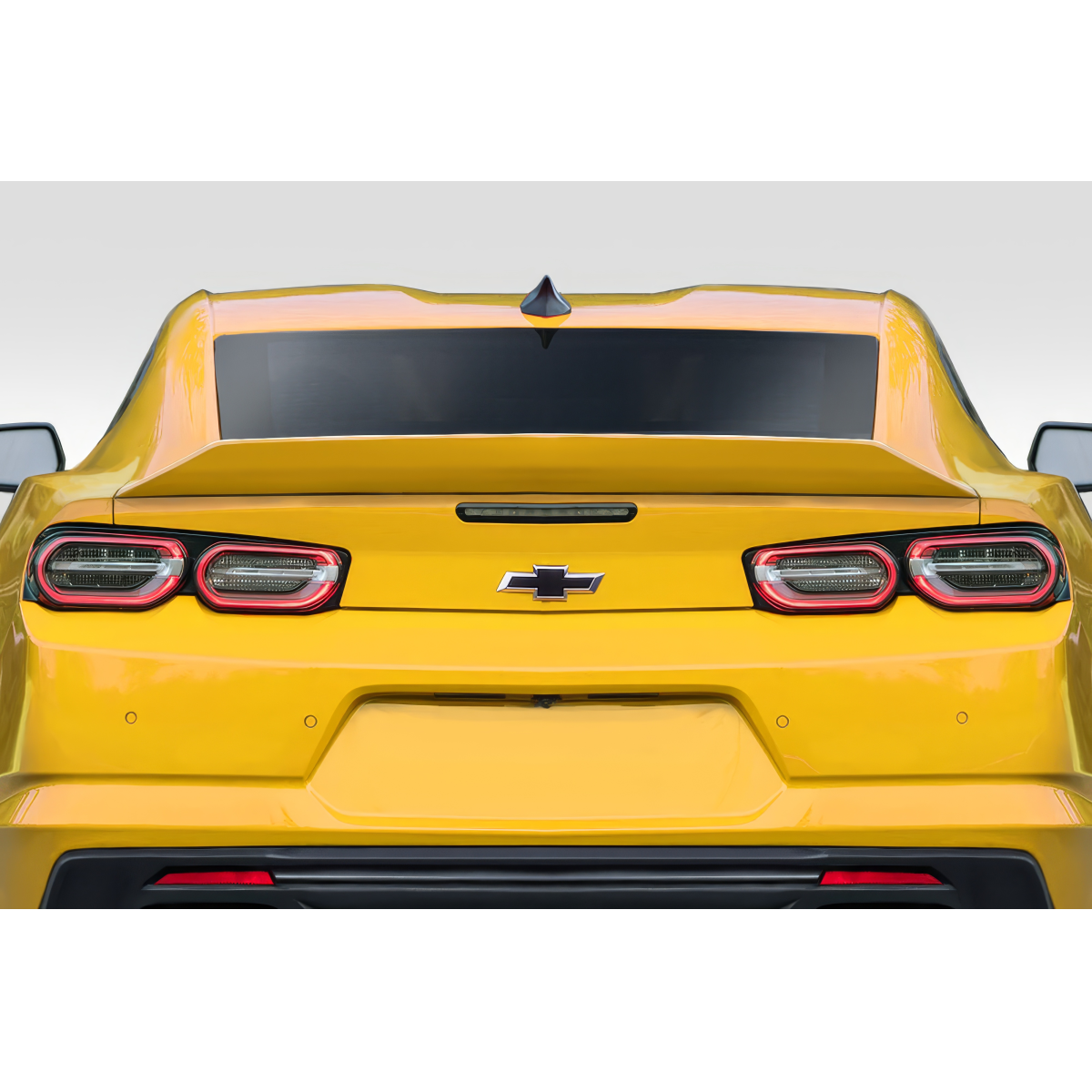 Modify your Chevrolet Camaro 2016 with our Exterior/Wings - Rear view angle of a yellow Camaro