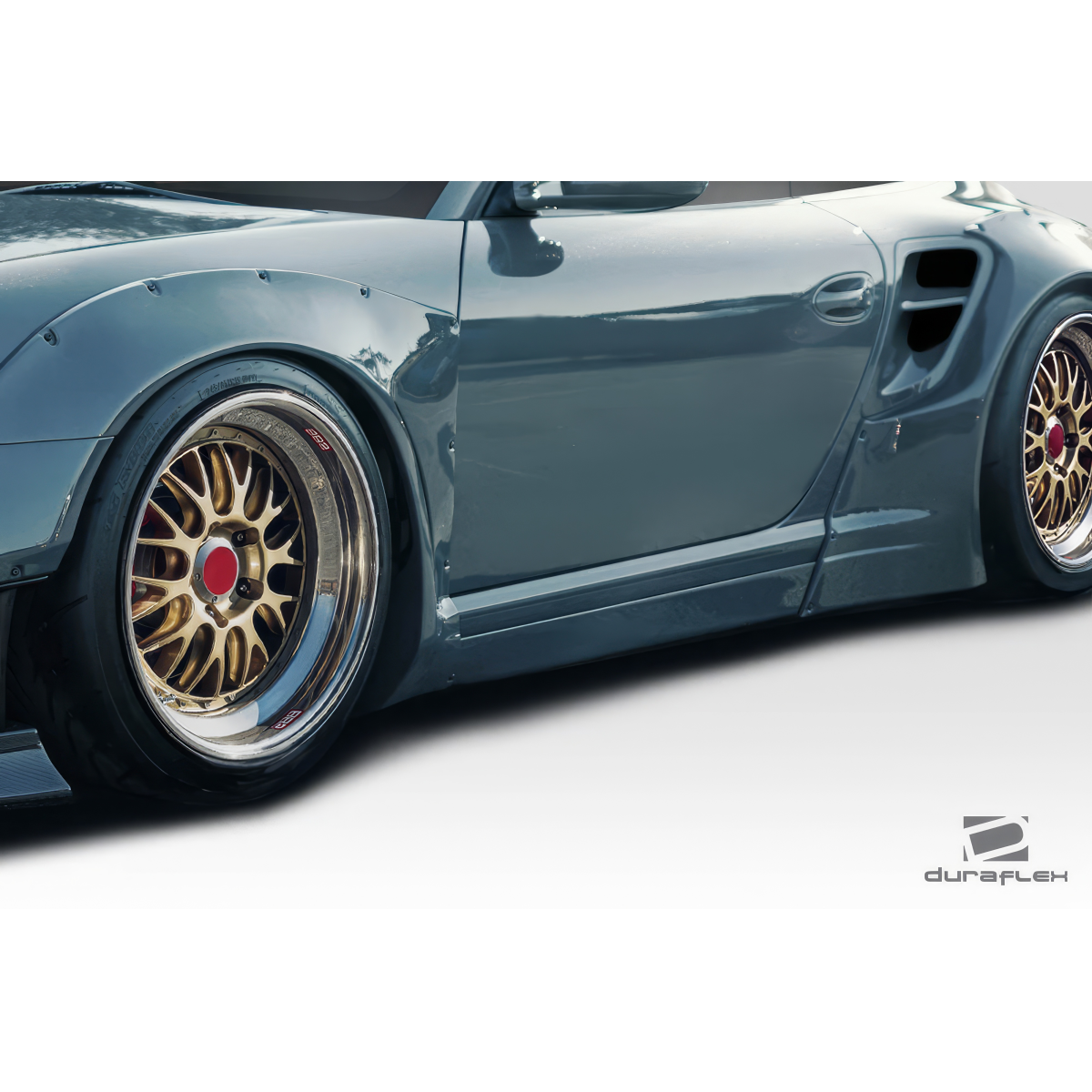 Modify your Porsche 911 2004 with our Exterior/Side Skirts - Side angle view showing custom body kit details