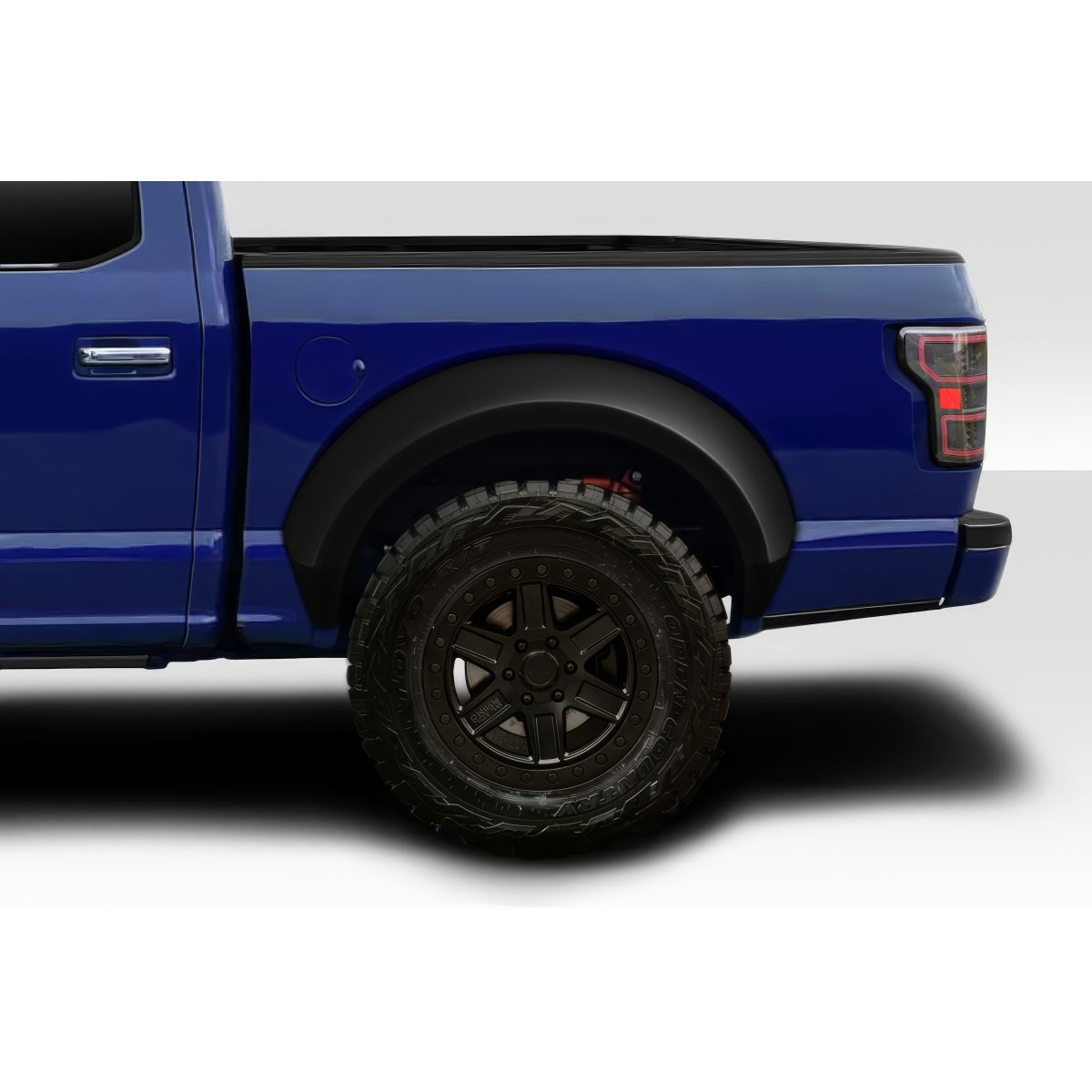 Modify your Ford F-150 2018 with our Exterior/Fenders - Side angle of a blue Ford F150 truck