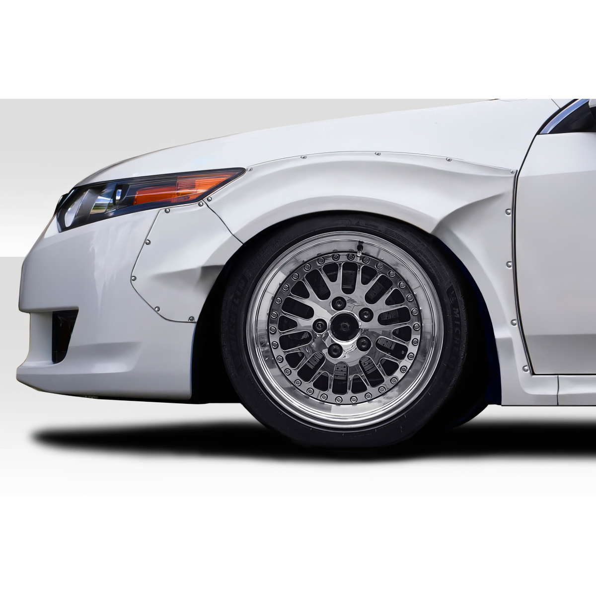 Modify your Acura TSX 2009 with our Exterior/Fenders - Image shows front fender flares at a side angle