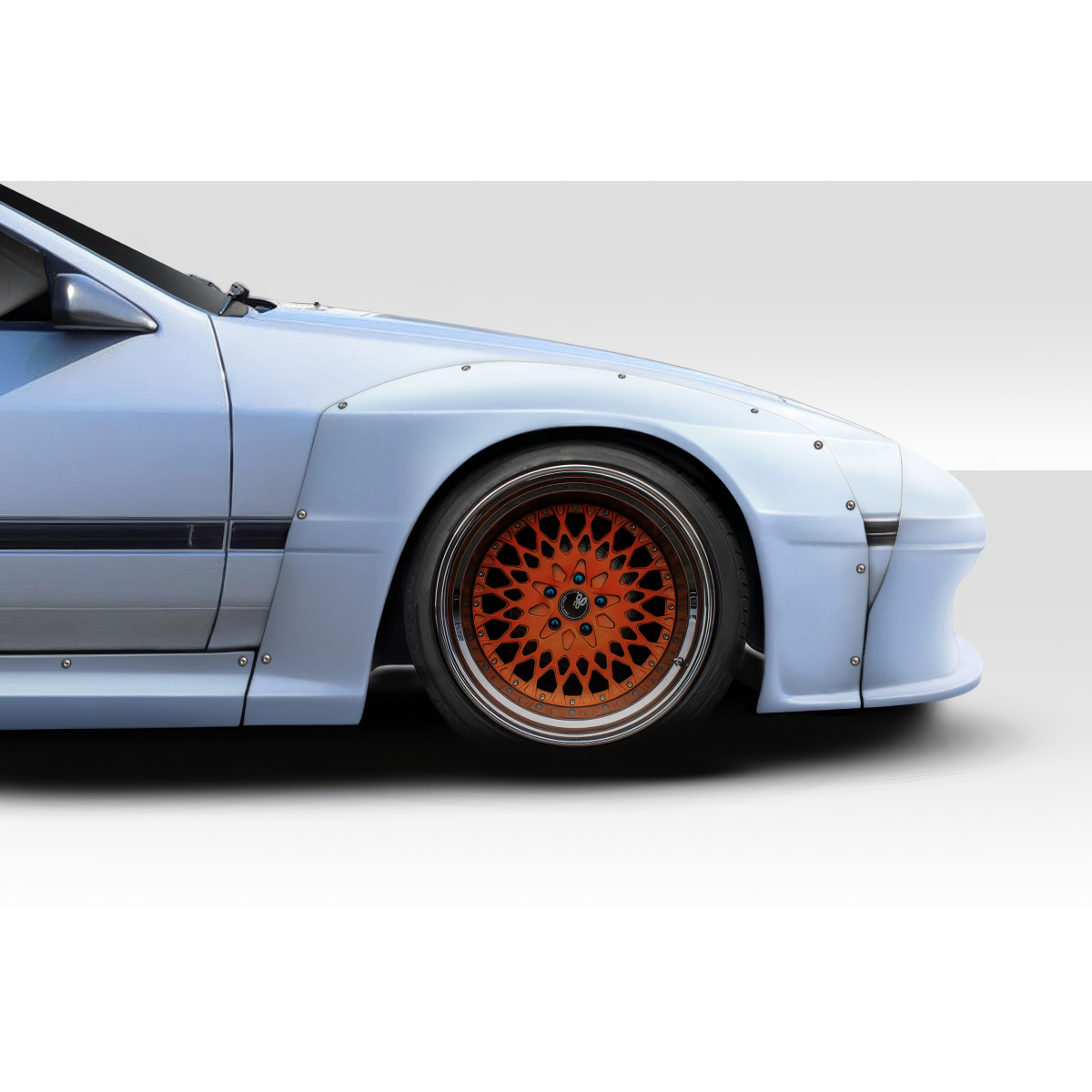 Modify your Mazda RX-7 1985 with our Exterior/Fenders - Side angle of vehicle highlighting fender flares