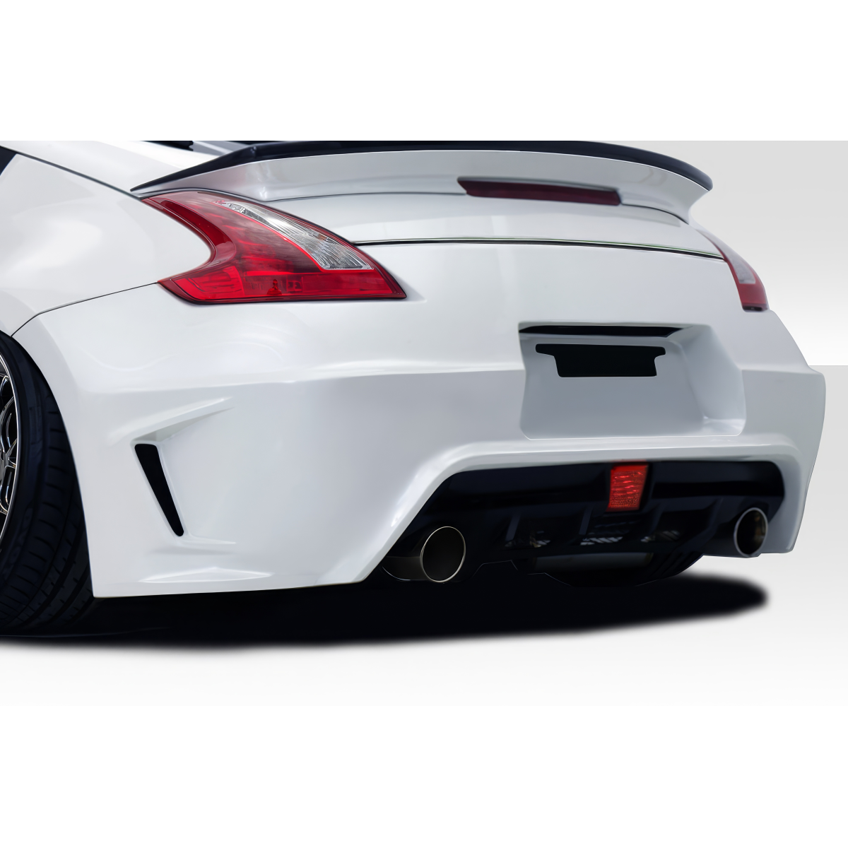 Modify your Nissan 370Z 2009 with our Exterior/Rear Bumpers or Lips - Rear angle view of Nissan 370Z Duraflex bumper