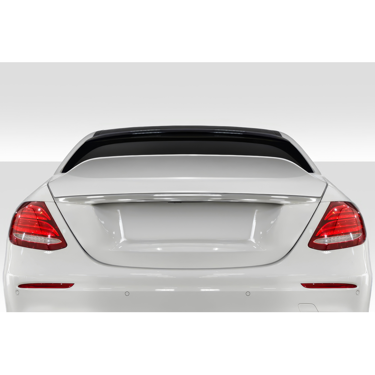 Modify your Mercedes-Benz E-Class 2017 with our Exterior/Wings - Rear view of the vehicle at slight angle