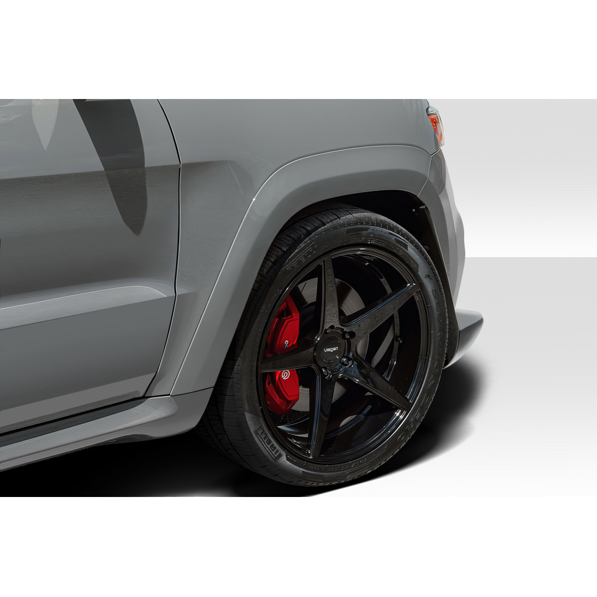 Modify your Jeep Cherokee 2011 with our Exterior/Fenders - Side angle view of vehicle fender and wheel