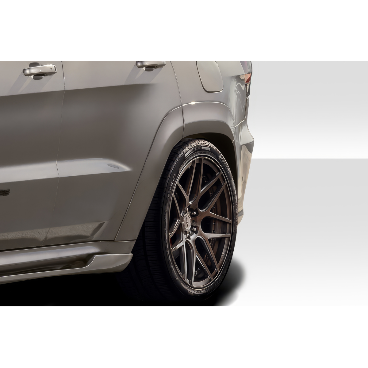 Modify your Jeep Cherokee 2011 with our Exterior/Fenders - Close up angle revealing rear fender and wheel