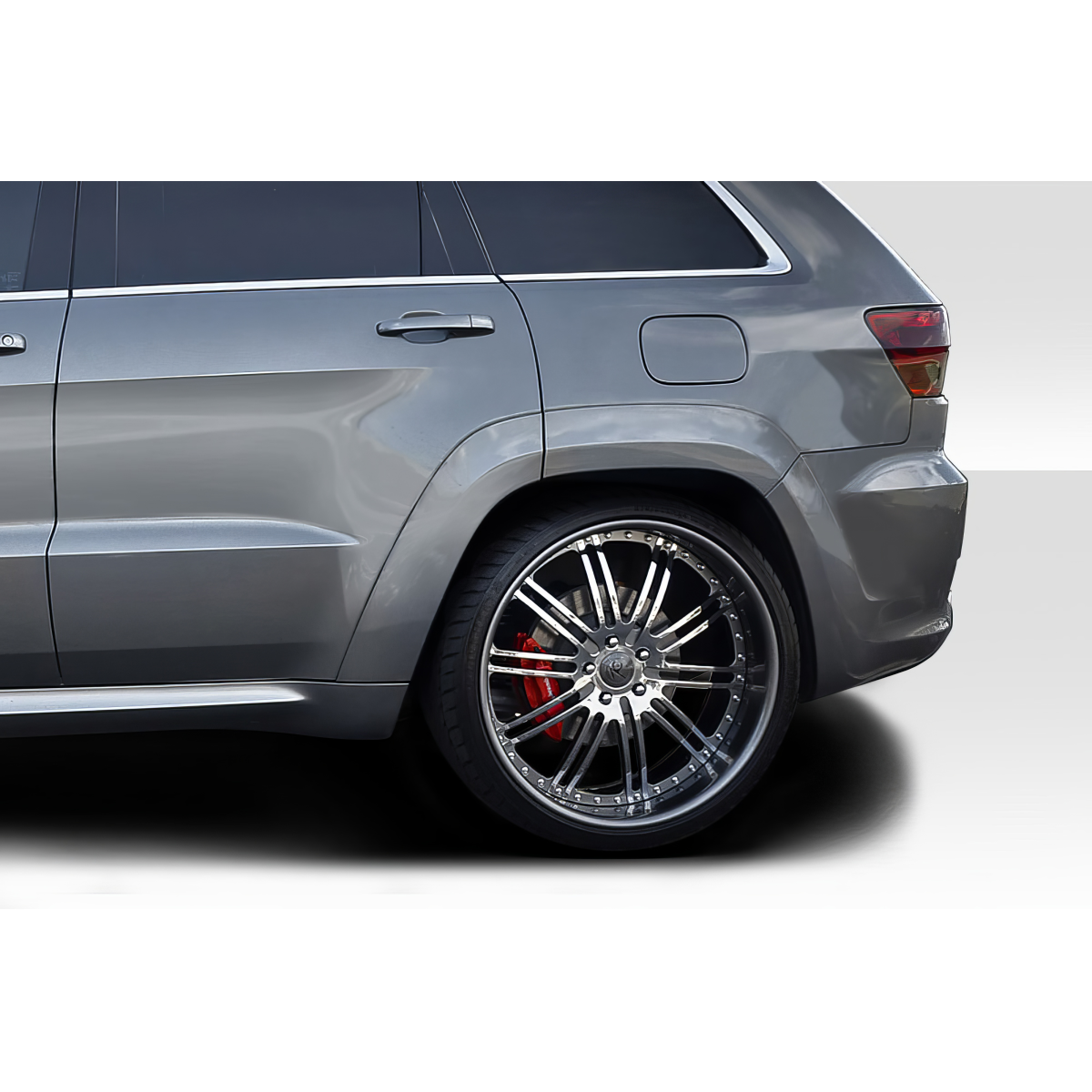 Modify your Jeep Cherokee 2011 with our Exterior/Fenders - Side view of rear fender with chrome wheel