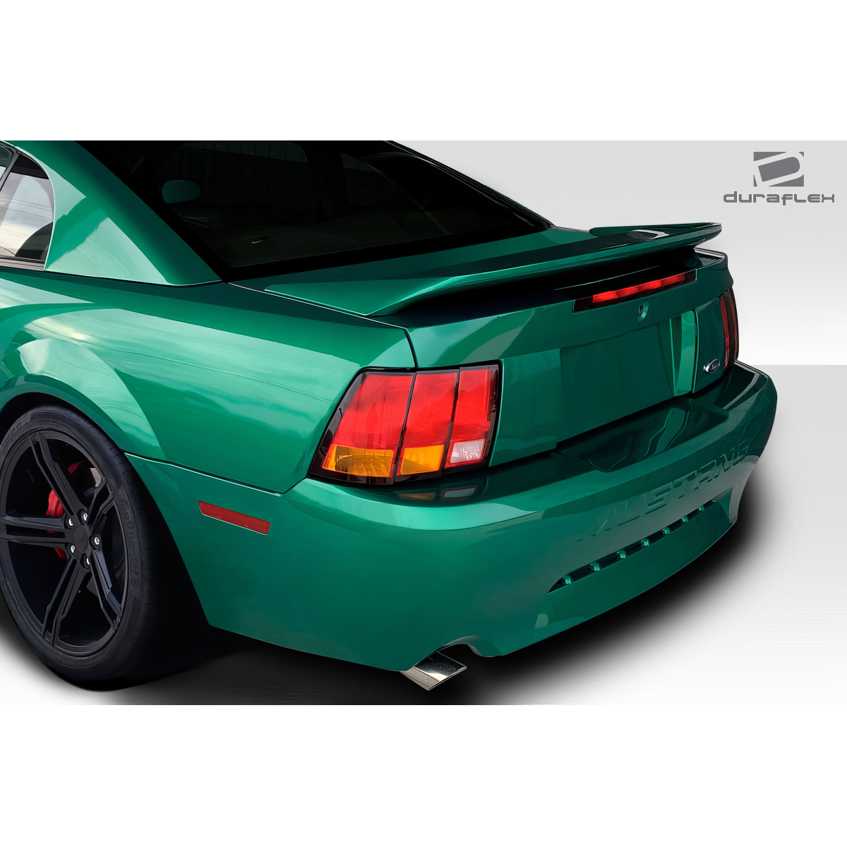 Modify your Ford GT 1999 with our Exterior/Wings - Rear angle view of a Ford GT with a spoiler