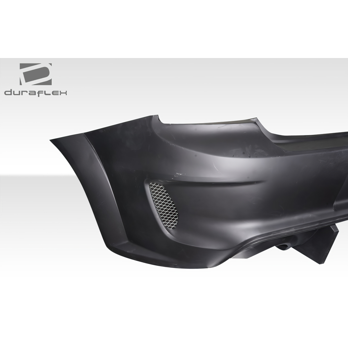 Modify your Dodge Charger 2015 with our Exterior/Rear Bumpers or Lips - Angle view of rear bumper from side
