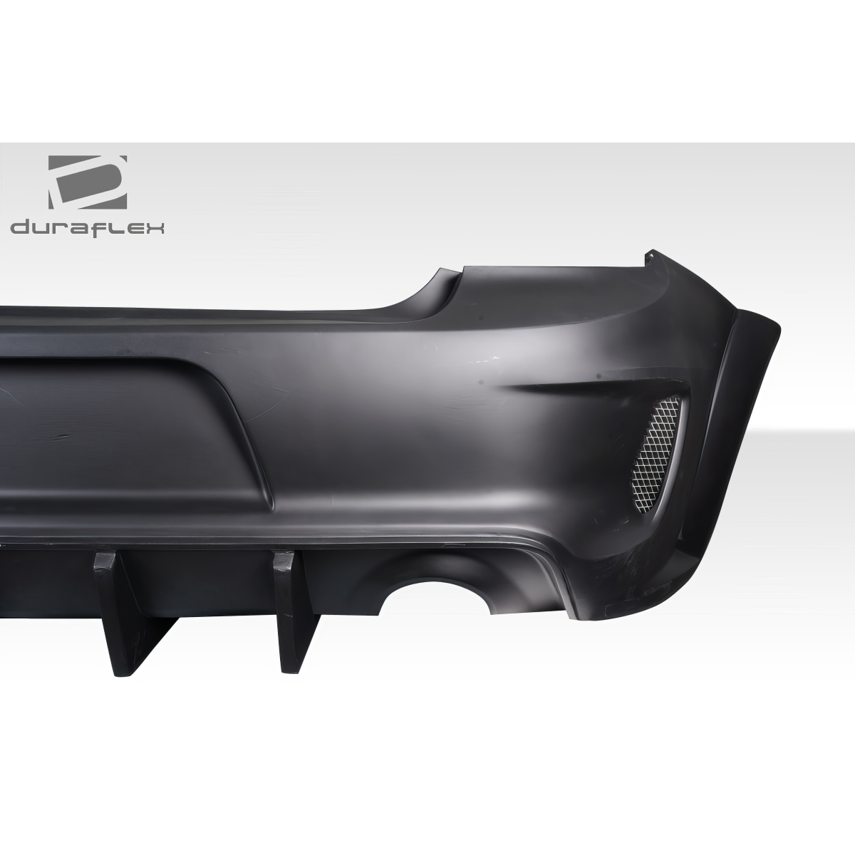 Modify your Dodge Charger 2015 with our Exterior/Rear Bumpers or Lips - Part viewed from side angle showing contours and mesh